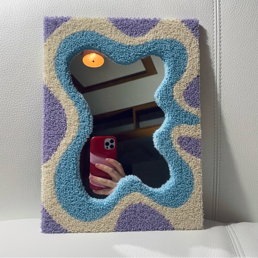 Tufted swirly mirror
